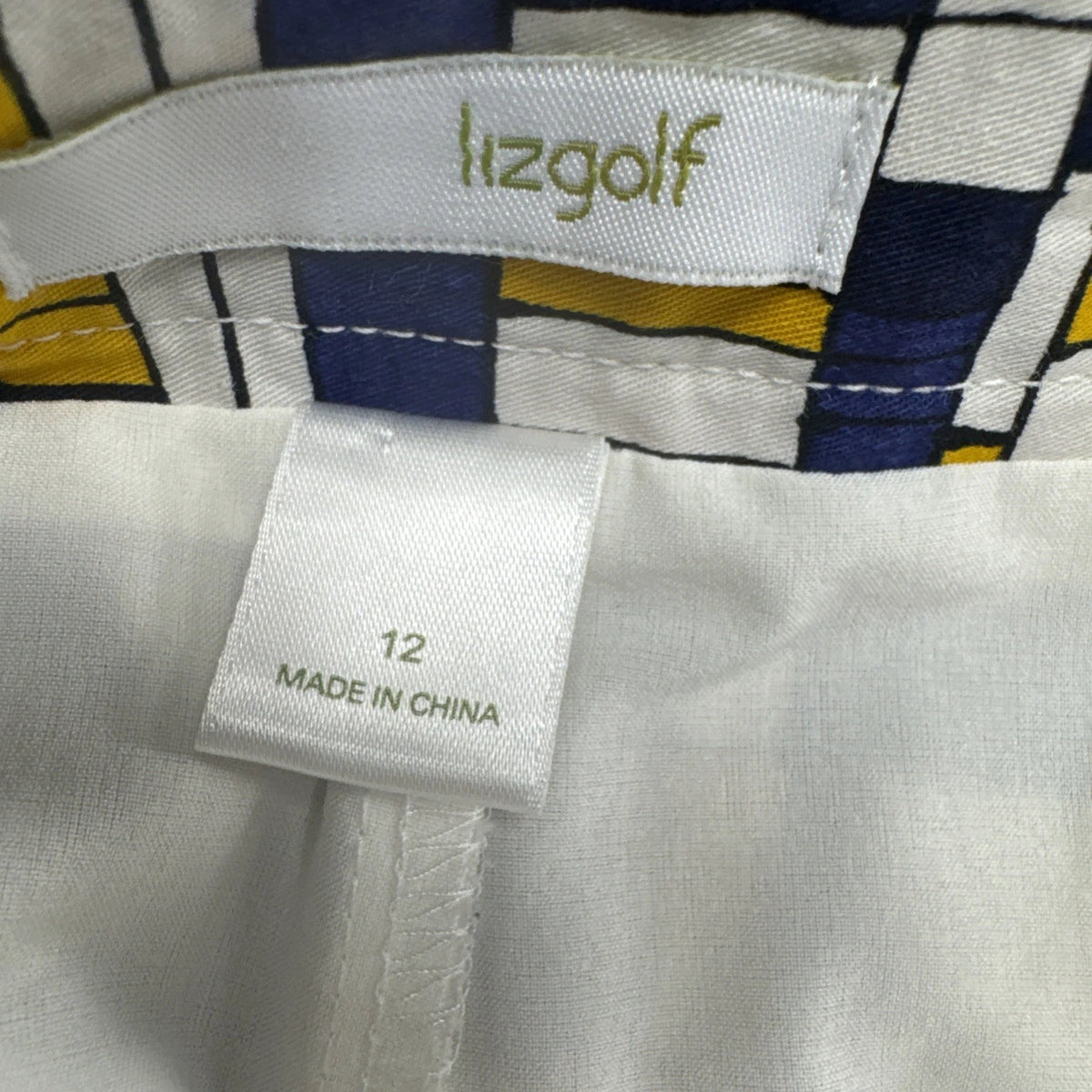 Lizgolf Women’s Golf Skort Skirt Blue Yellow Geometric Print Size 12