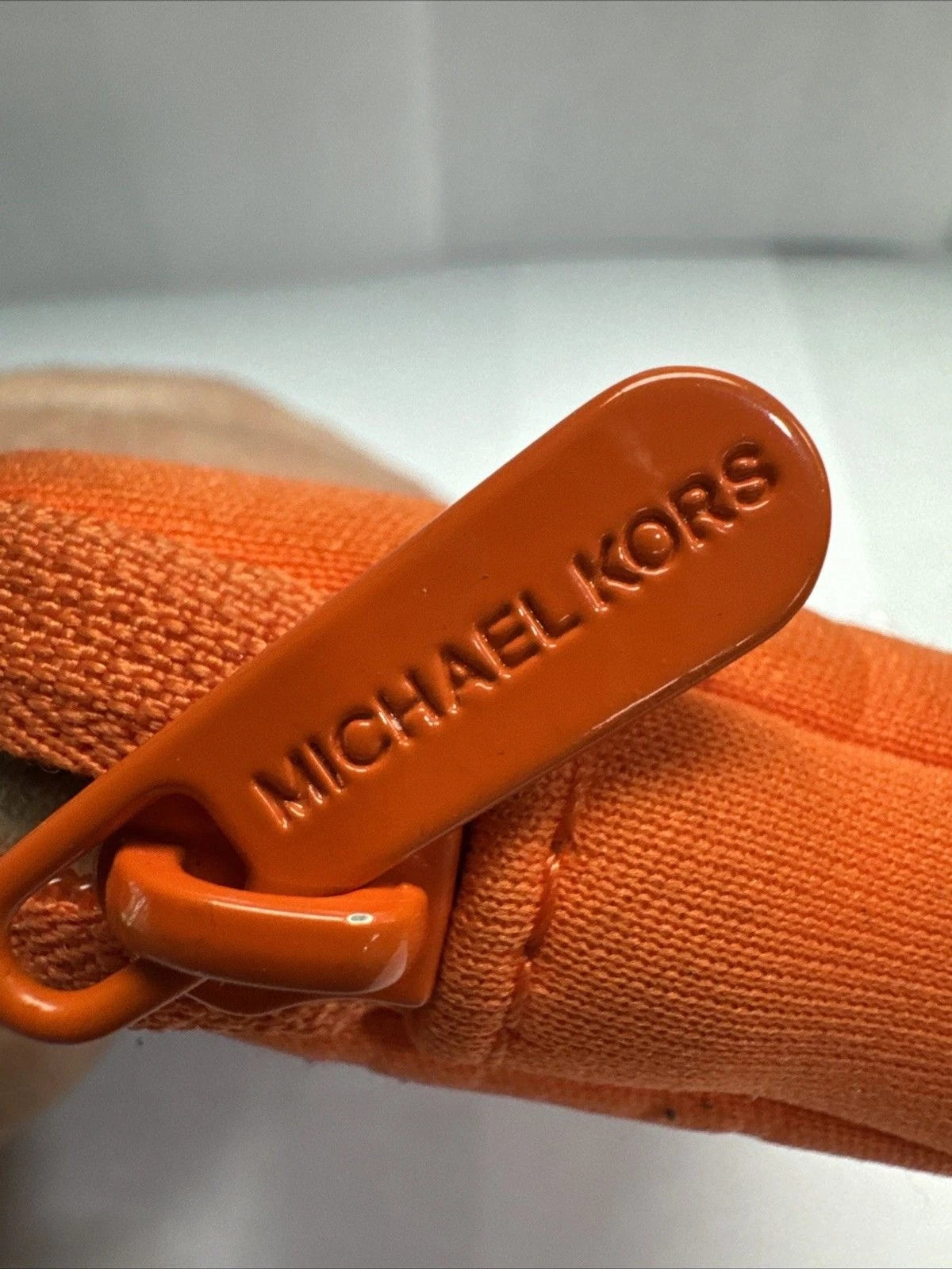 Michael Kors Orange Embossed Logo Neoprene Wristlet Zip Pouch Clutch Wallet