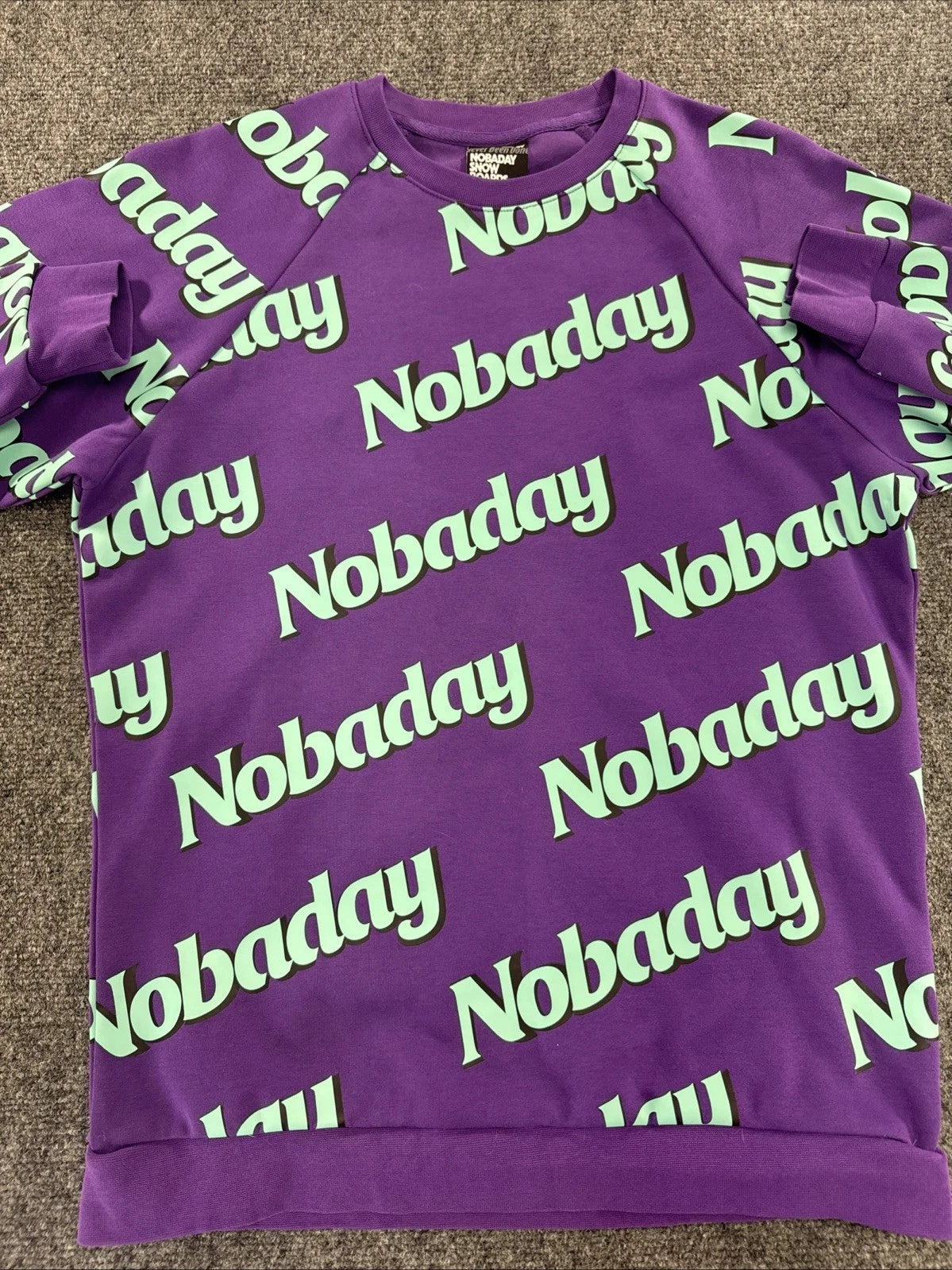 NOBADAY Never Been Done All Over Logo Crewneck Sweatshirt Purple Green