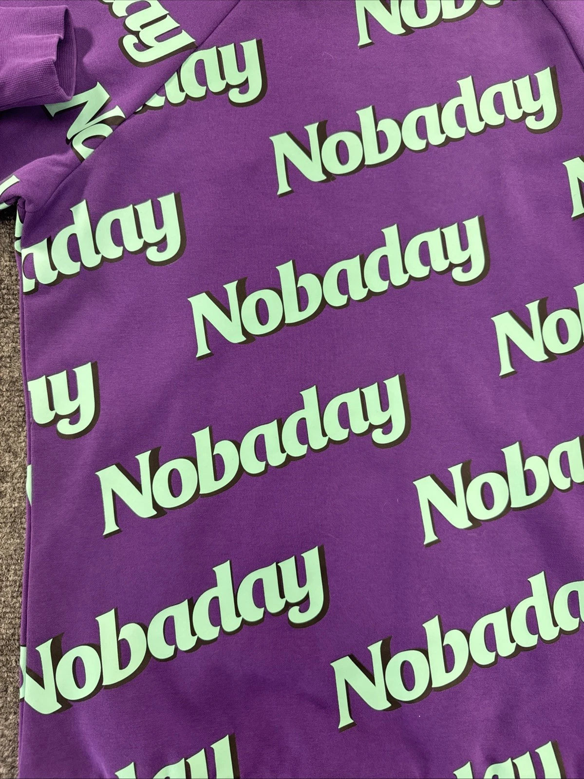 NOBADAY Never Been Done All Over Logo Crewneck Sweatshirt Purple Green